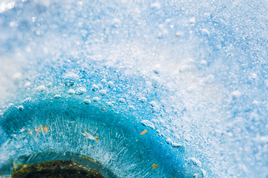 Macro image of blue ice with small depth of field.