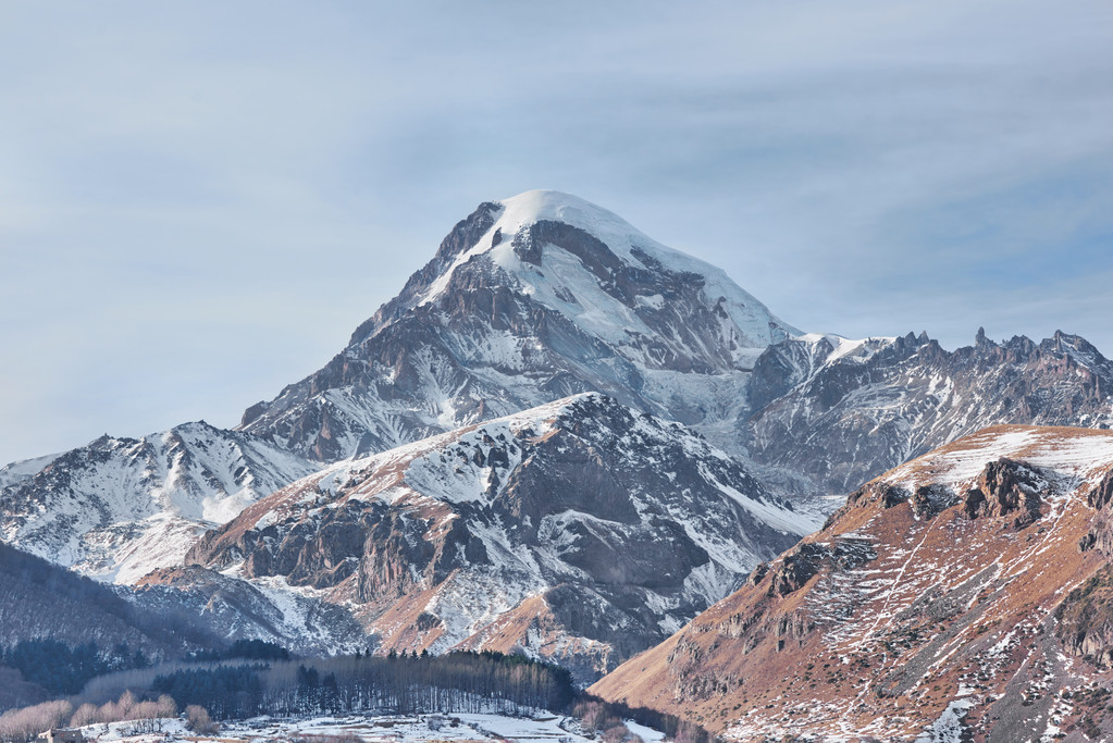 amazing snowy sunny landscape with beautiful peak